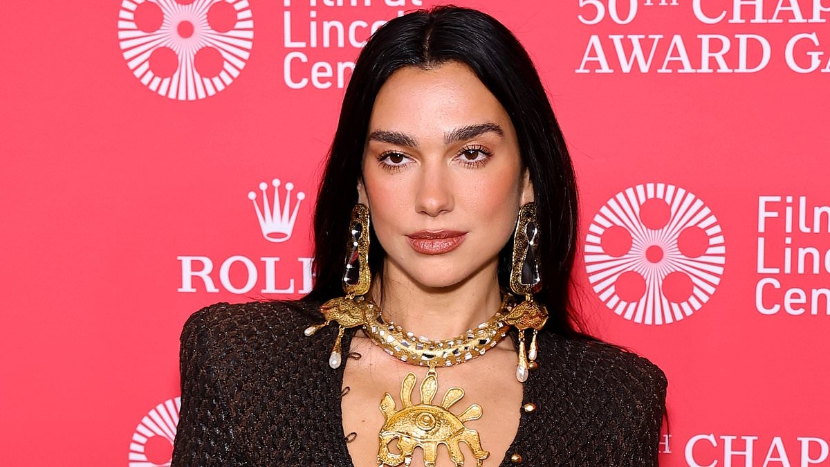 Dua Lipa looks sensational in sheer black mesh dress at New York gala