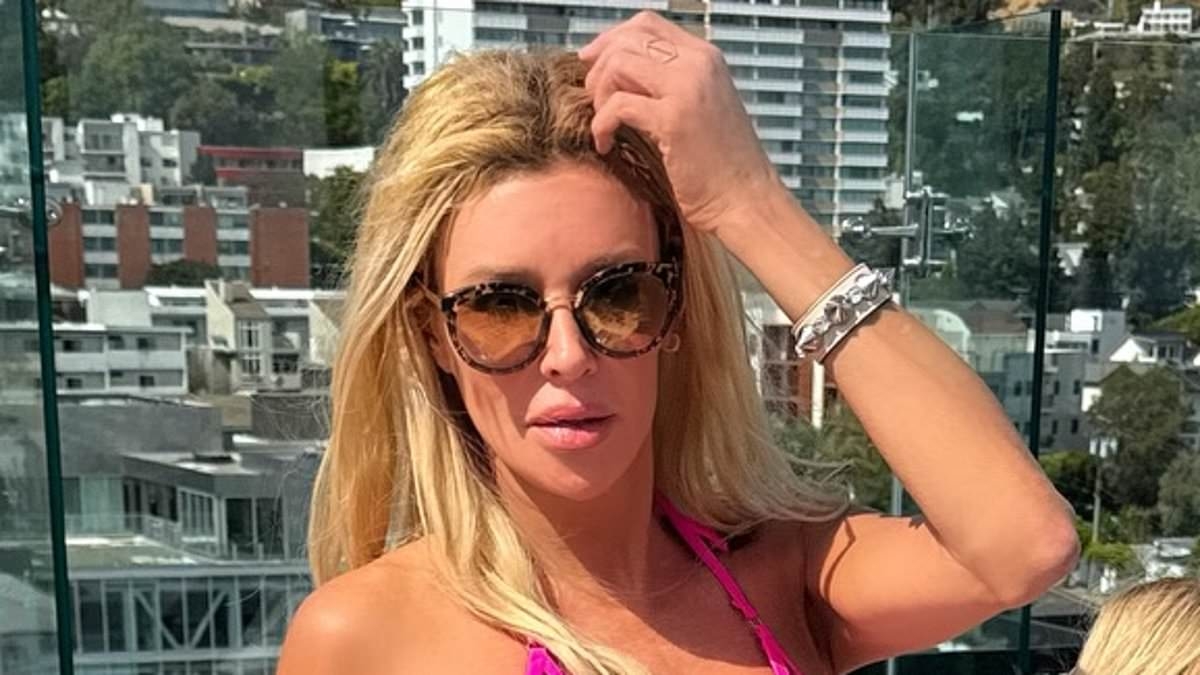 Disfigured Brandi Glanville hides behind sunglasses for bikini shoot with porn star after 'laser face lift'