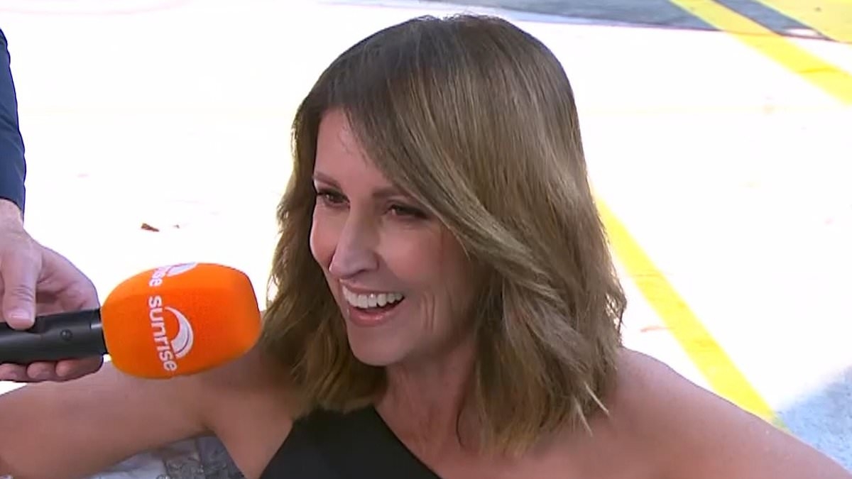 Sunrise host Natalie Barr sizzles in a swimsuit as she plunges into freezing ice bath live on air
