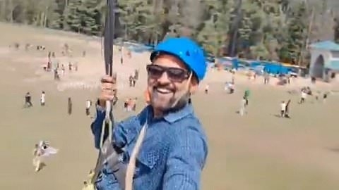 Smiling tourist ziplines over Kashmir terror attack unaware of 26 people being murdered below him