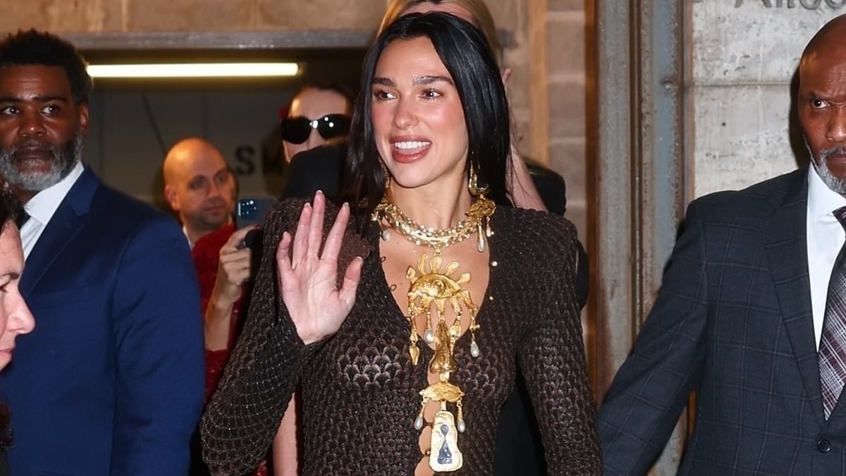 Dua Lipa goes braless and cheekily flashes her bottom in a semi-sheer dress as she leaves 50th Chaplin Award Gala in New York