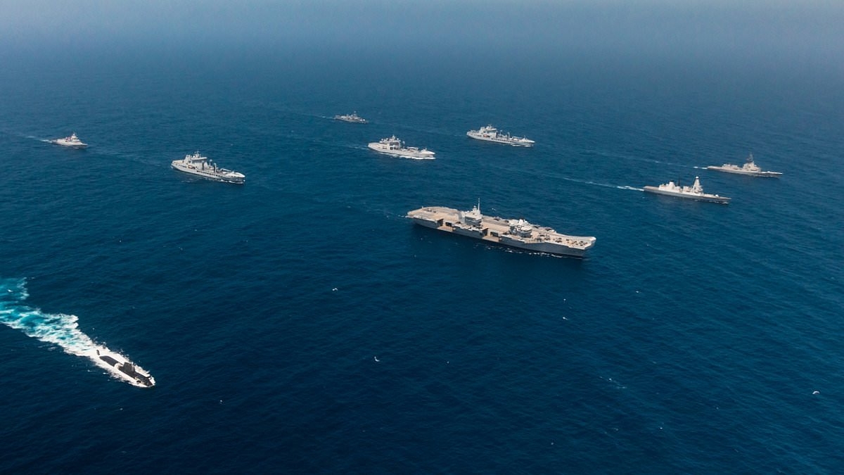 HMS Prince of Wales leads show of military force as £3.5billion aircraft carrier spearheads fearsome fleet of warships in the Mediterranean - with crew ready to defy China over Taiwan