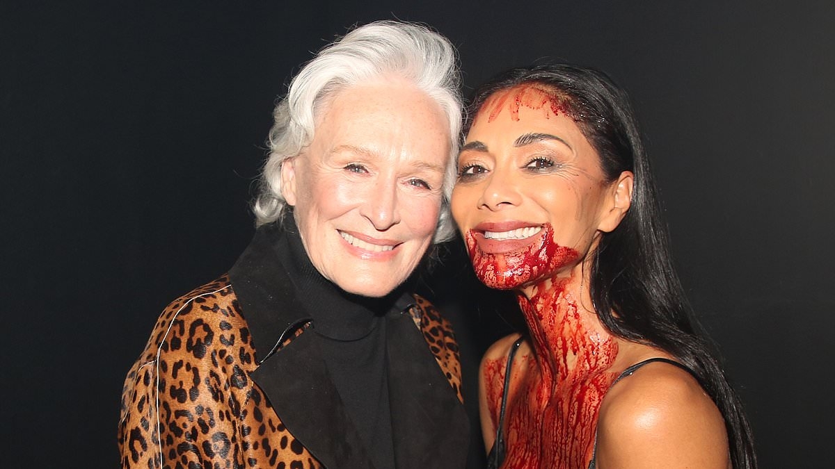 Nicole Scherzinger is drenched in fake blood as she poses alongside former Sunset Boulevard star Glenn Close after another Broadway performance
