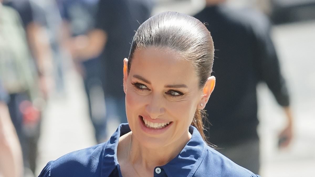 Kirsty Gallacher, 49, stuns in a blue jumpsuit as she leaves The Vanessa Feltz show after opening up about hearing loss and 'severe tinnitus'