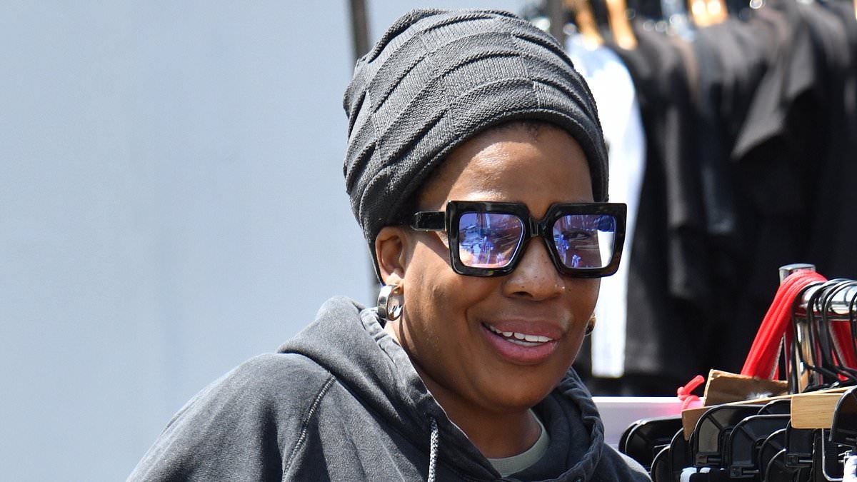 Multimillion-record-selling artist is unrecognizable bargain hunting in LA... can you guess who she is?