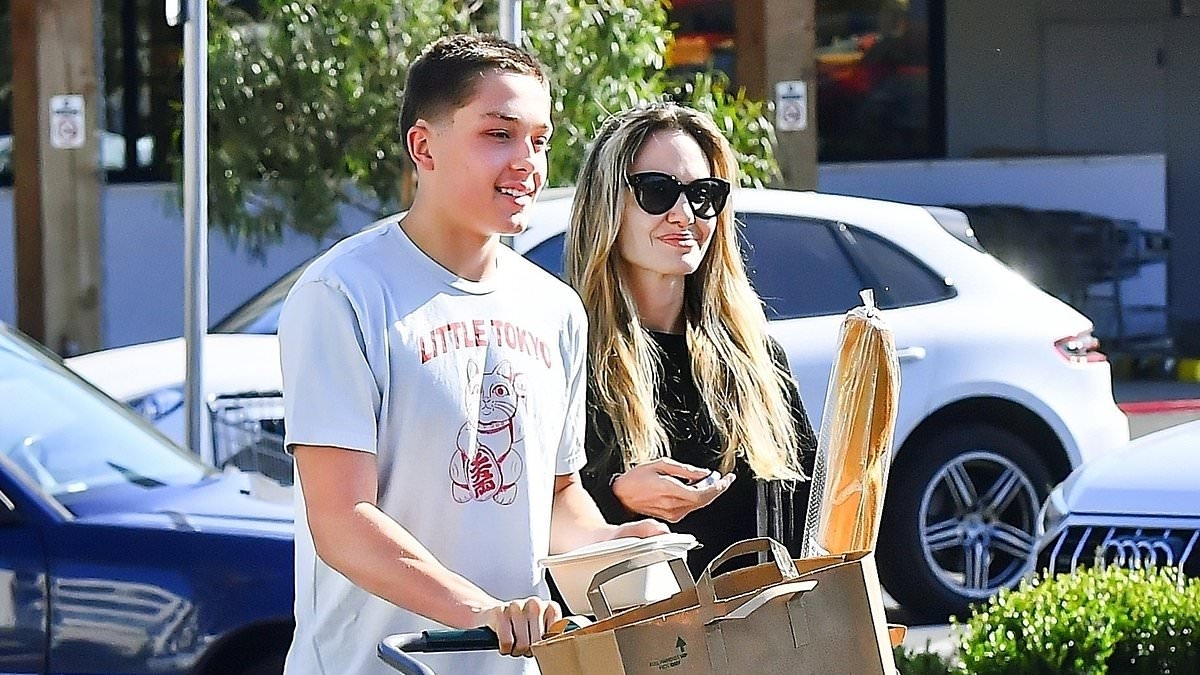 Angelina Jolie's son Knox, 16, towers over her after growing to same height as estranged father Brad Pitt