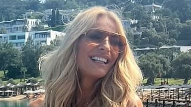 Tess Daly, 56, flaunts her abs in a tiny bikini while partying with her pals on board a luxury yacht during girls' holiday