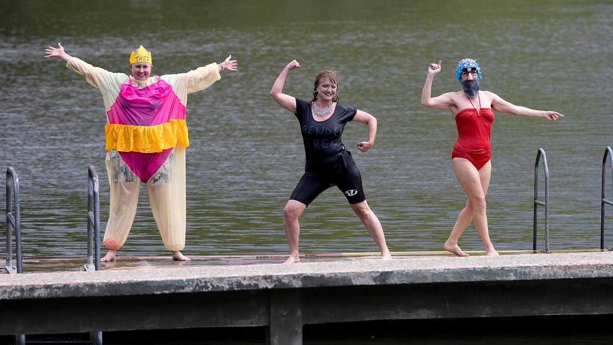 EXCLUSIVE Women's rights campaigners storm male pond at Hampstead Heath in false beards, wigs and moustaches in protest over self-ID rule at ladies-only pool