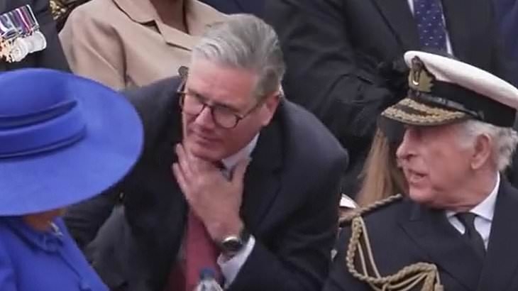 Keir to the rescue! Prime Minister springs into action to hand Queen Camilla a bottle of water during VE Day military procession