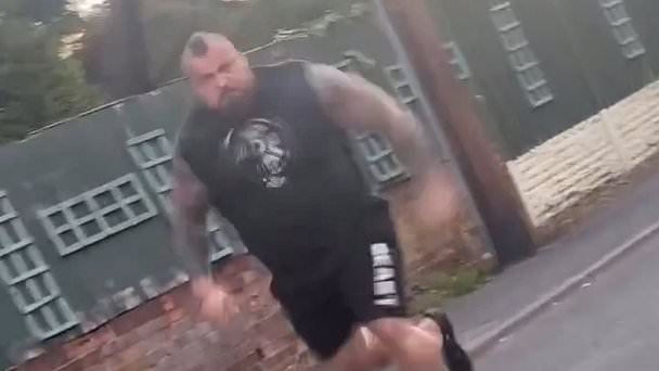 BREAKING NEWS Moment former World's Strongest Man Eddie Hall chases after car screaming 'I'll rip your head off' after drivers outside his house 'scared his children'