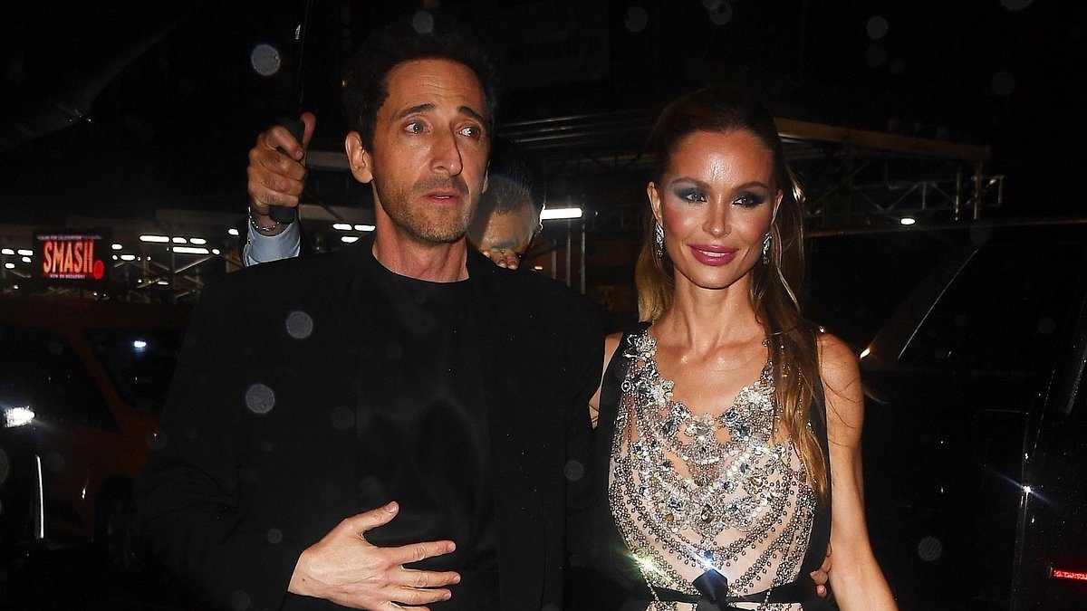 Adrien Brody puts on a loved-up display with stylish girlfriend Georgina Chapman as they attend A$AP Rocky's Met Gala afterparty