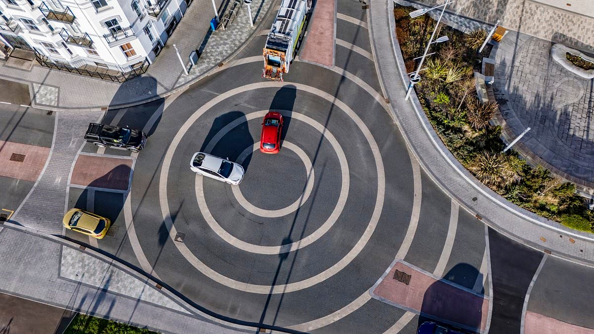 Is this the WORST roundabout? Despairing residents on 'woke' Isle of Man blast 'crazy' painted oval 'roundel' introduced as part of £26million revamp and insist it is a 'deathtrap'