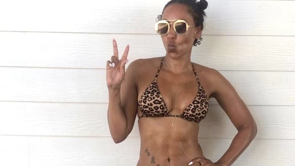 Mel B, 49, shows off her ageless physique in a signature leopard print bikini as she shares then and now snaps amid claims of Spice Girls reunion tour
