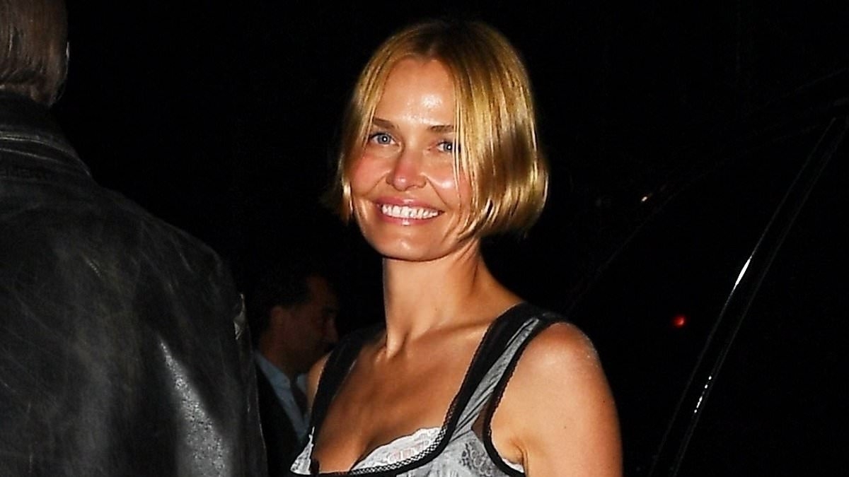 Lara Worthington dons a sheer corset over a white nightdress as she arrives at a Met Gala afterparty in New York City
