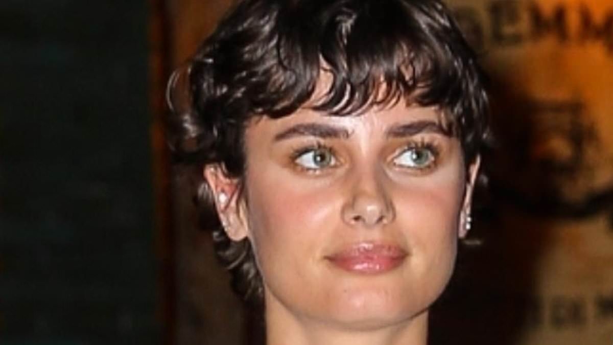 Taylor Hill dresses down in denim jeans and embroidered knitwear as she ditches the glam for romantic night out with husband Daniel Fryer