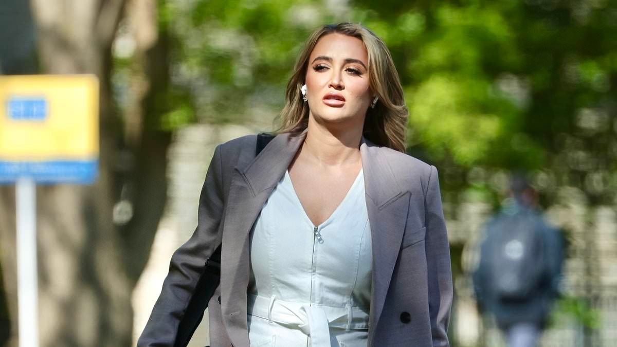 Pregnant Georgia Harrison cuts a trendy figure in white jumpsuit as she steps out for a stroll after sharing sweet first-trimester video