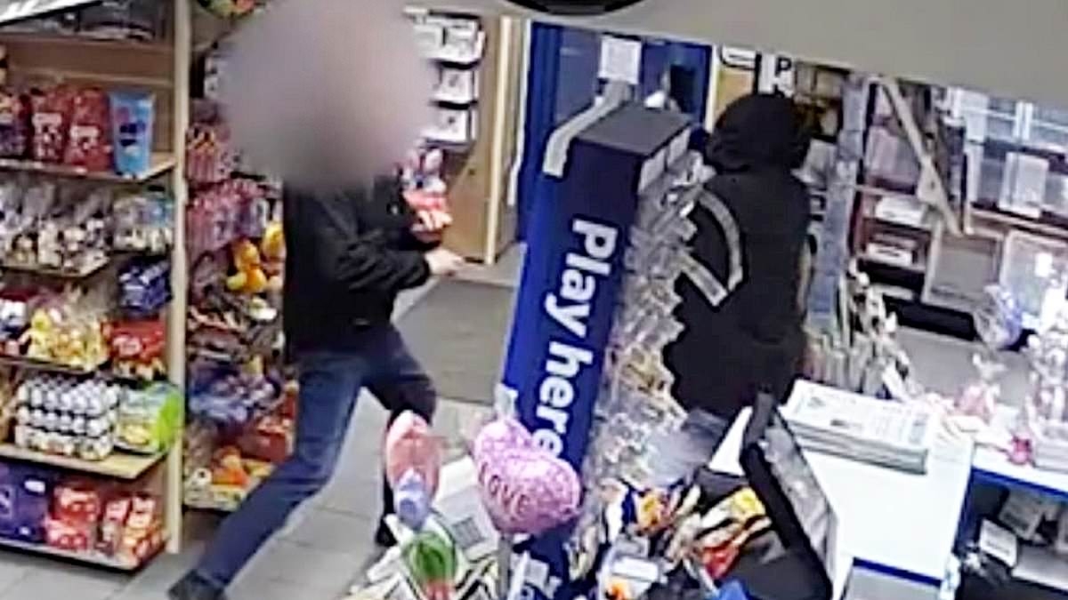 Amazing moment heroic shop worker fights off knife-wielding robber with his bare hands after thug threatened his female colleague