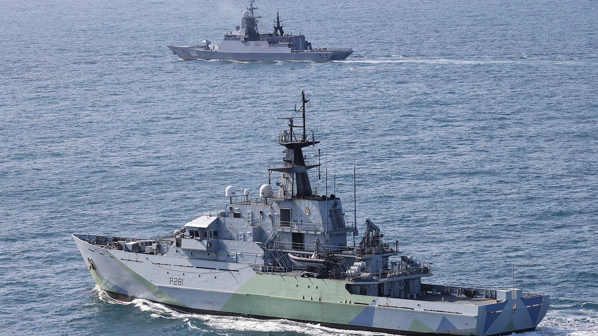 Royal Navy warship tracks Russian submarine and ships passing through English Channel as armed forces minister warns of Kremlin 'threat' to UK