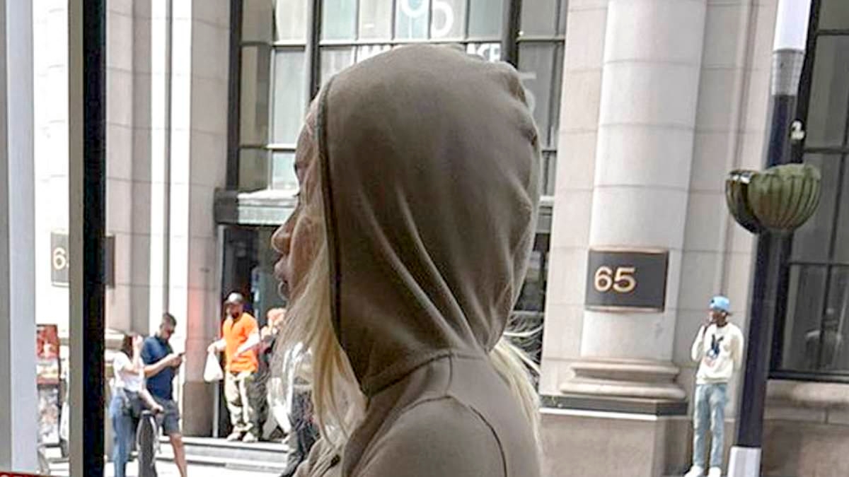 Cardi B is unmissable as she flaunts her giant butt while shopping for groceries
