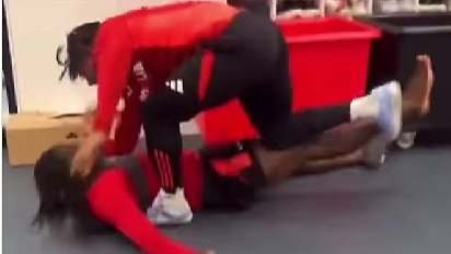 Adama Traore shows off his monstrous strength by FLOORING Calvin Bassey during friendly tussle in the Fulham changing room as fans tell the hulking winger to try UFC