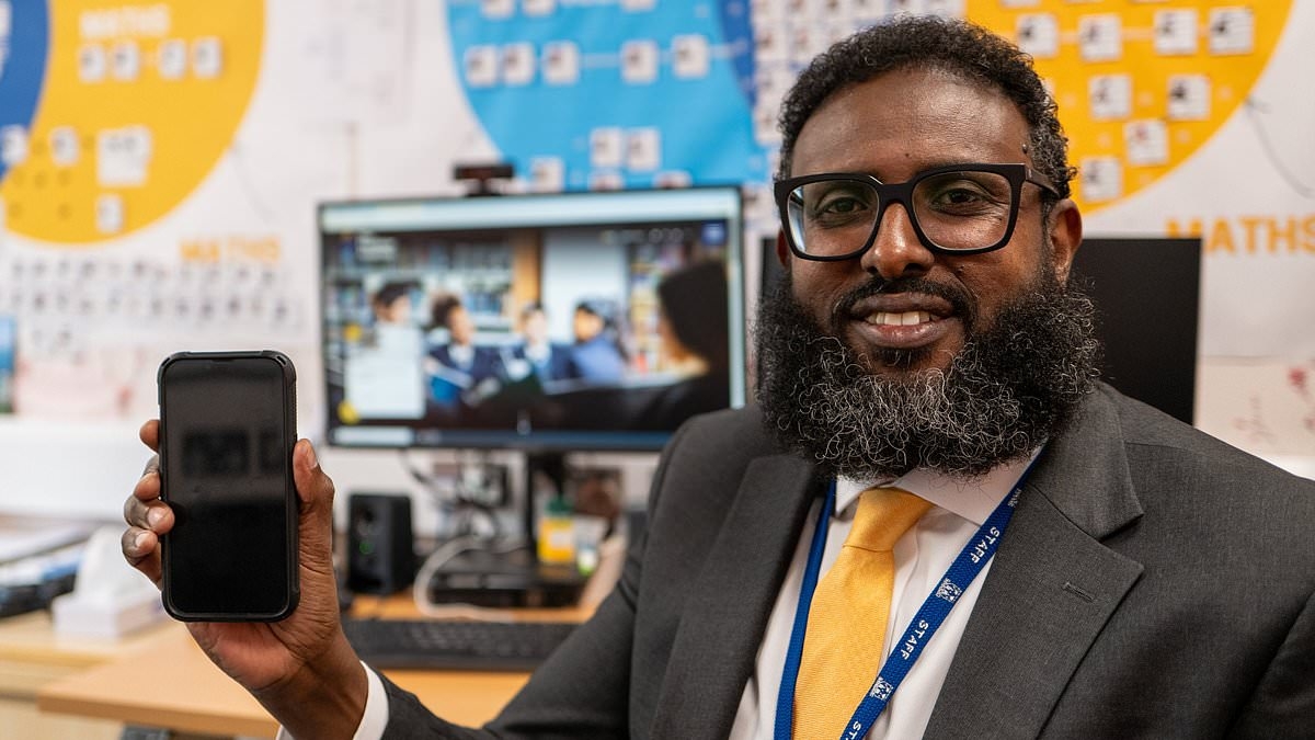 London headteacher brags his school exam results have jumped a grade since he introduced a no-nonsense ban on phones despite Labour claiming policy is unnecessary