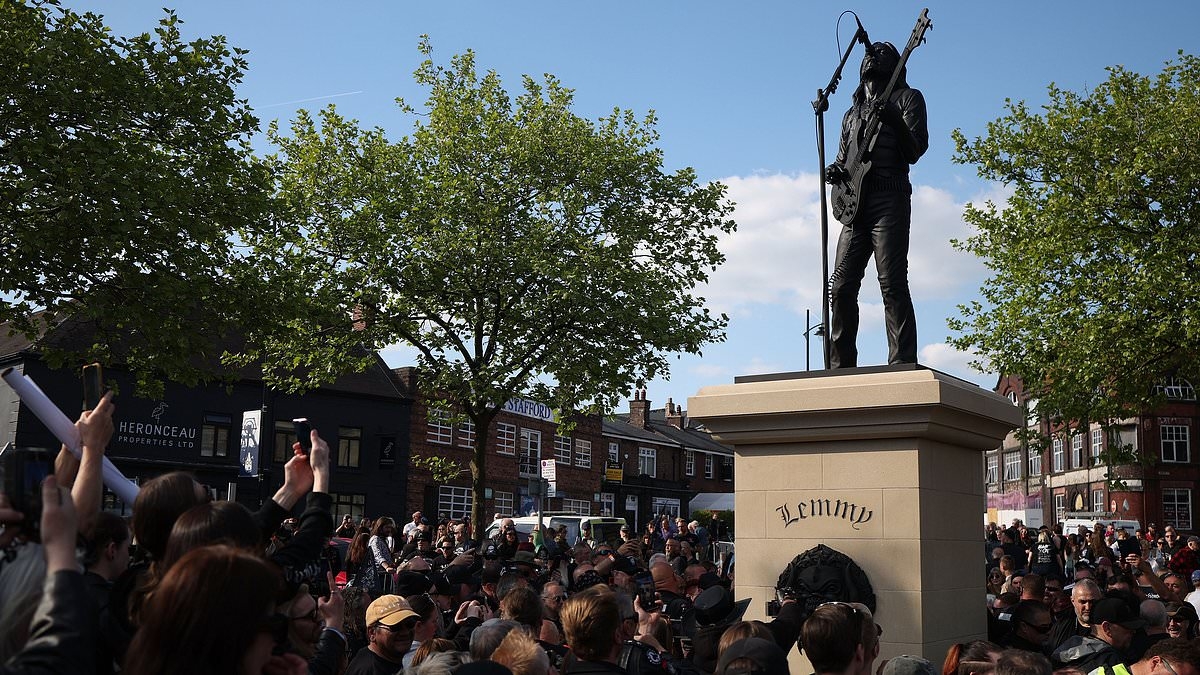 Dead man's fans again! Hundreds of Motörhead fans arrive in Stoke as statue of front man Lemmy famous for their hit Ace Of Spades is unveiled in his home town
