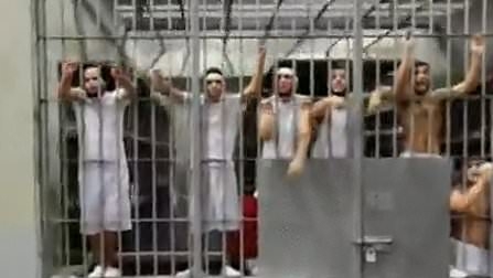 Deported 'Tren de Aragua gangsters' scream in distress in first video from inside El Salvador prison