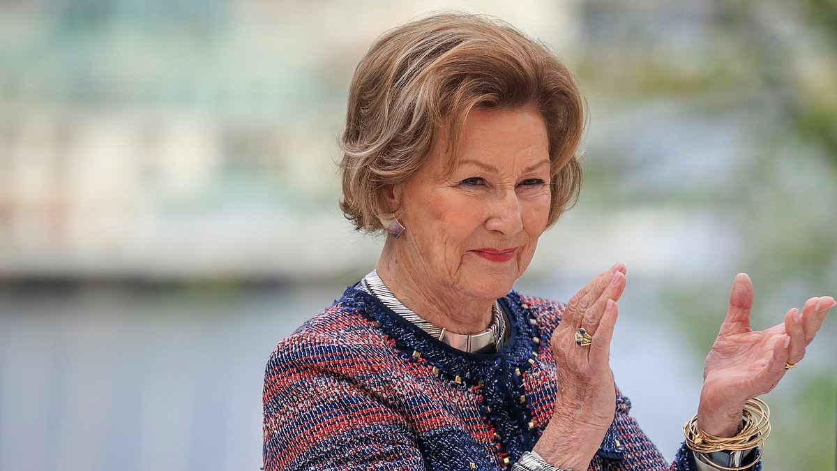 Queen Sonja of Norway, 87, beams as she attends first official engagement since being rushed to hospital for 'breathing difficulties'