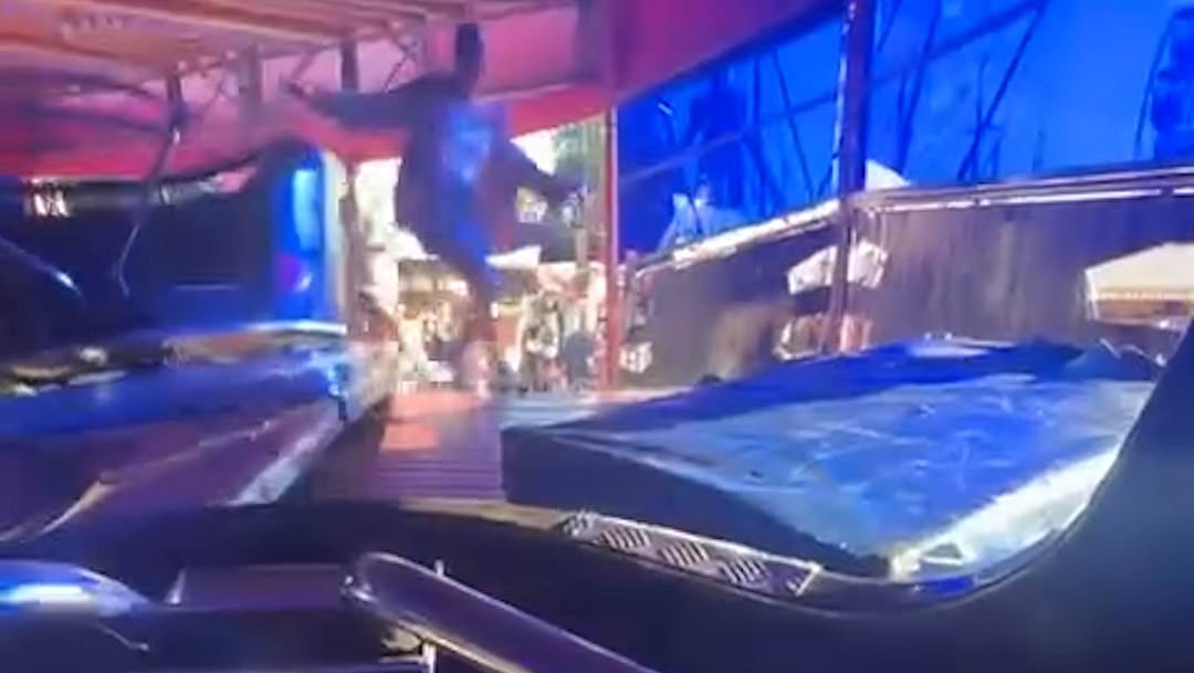 Terrifying moment waltzer car malfunctions and hurtles off fairground ride as children trapped inside scream in terror