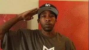 50 Cent's rapper friend Bang Em Smurf is staying in a taxpayer-funded UK asylum hotel - after being jailed over a shootout in the US