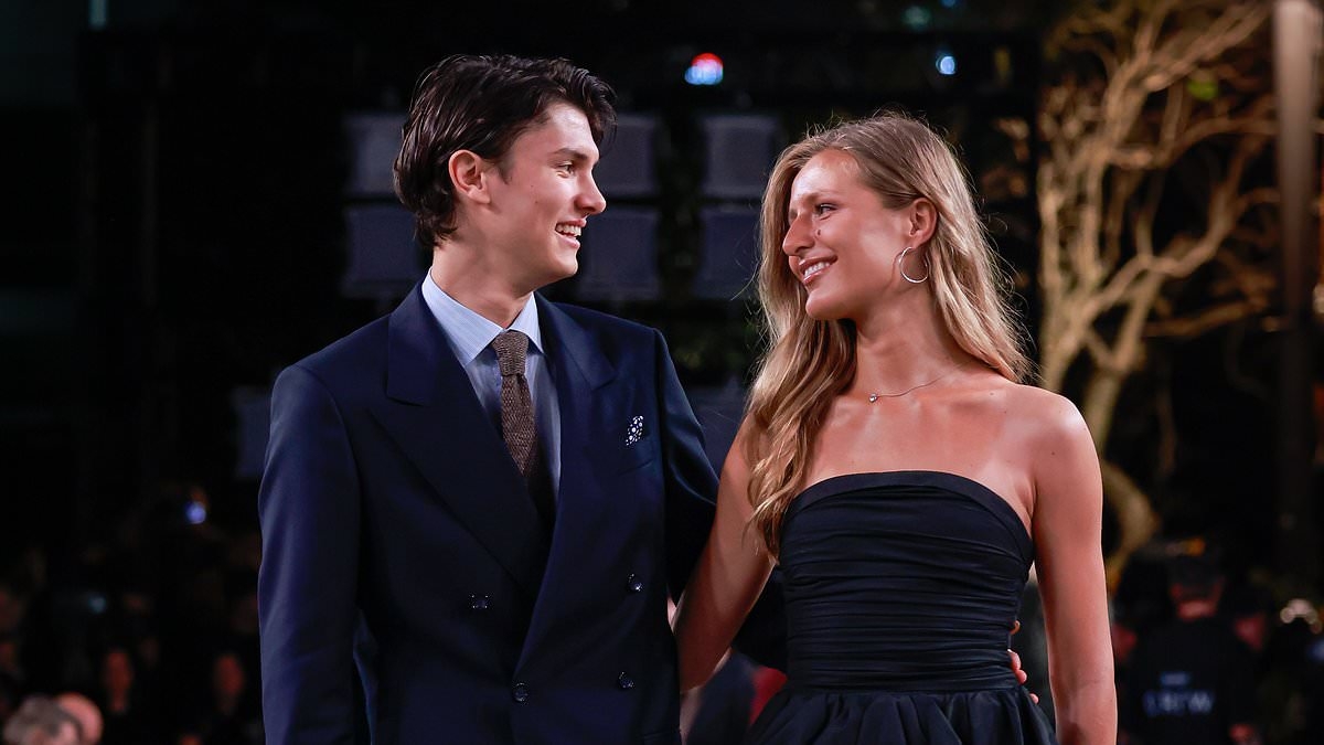 Queen Mary's nephew Count Nikolai puts in loved-up appearance with girlfriend Benedikte Thoustrup after split rumours as the budding model attends Australian Fashion Week