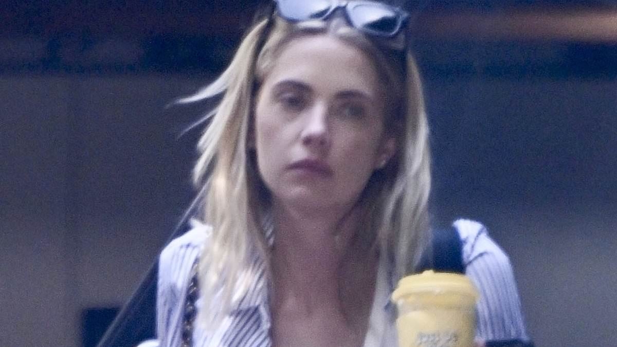 Ashley Benson flashes her bikini top after brunch with husband Brandon Davis at the Beverly Hills Hotel