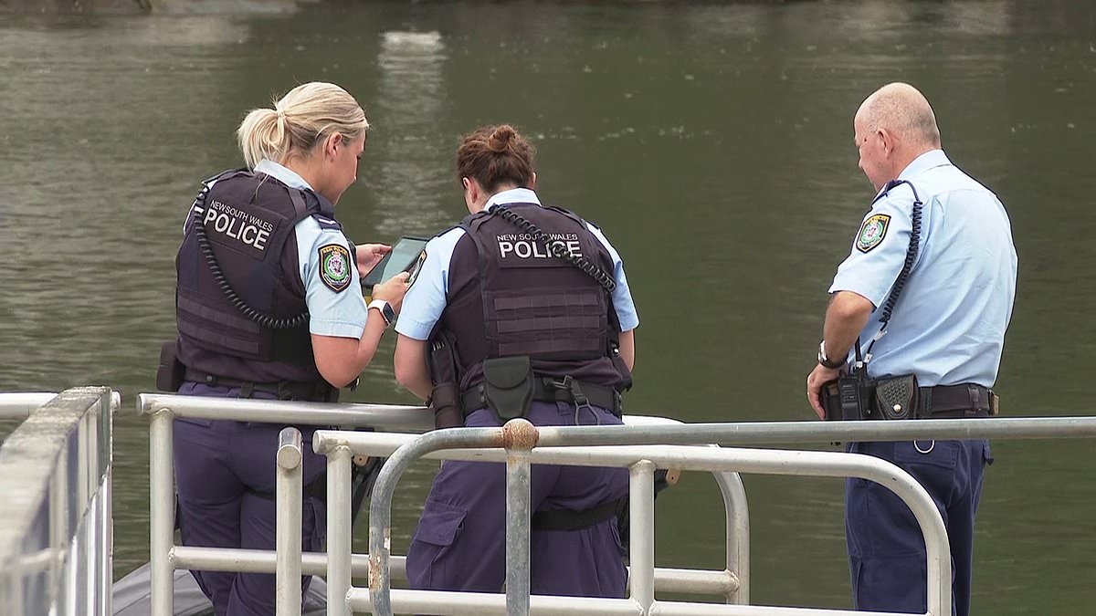 BREAKING NEWS Horror as 'naked' body is found floating near expensive Sydney suburb