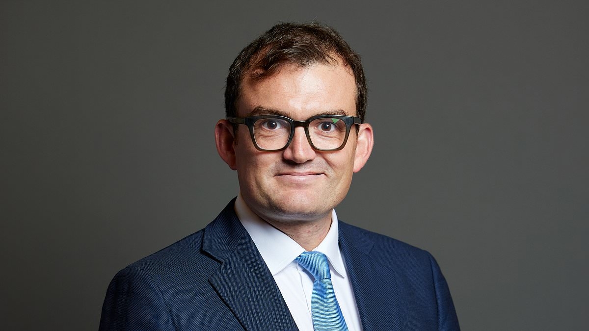 BREAKING NEWS Tory MP is charged with 'sexually assaulting two women at A-list hangout Groucho Club'