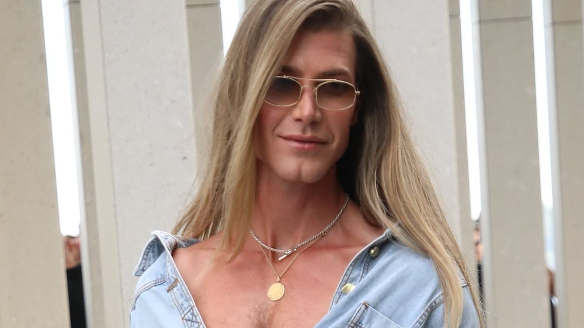 Who wore it better? Christian Wilkins and Lucia Hawley rock up to Australian Fashion Week Day Three in very similar baby blue denim ensembles