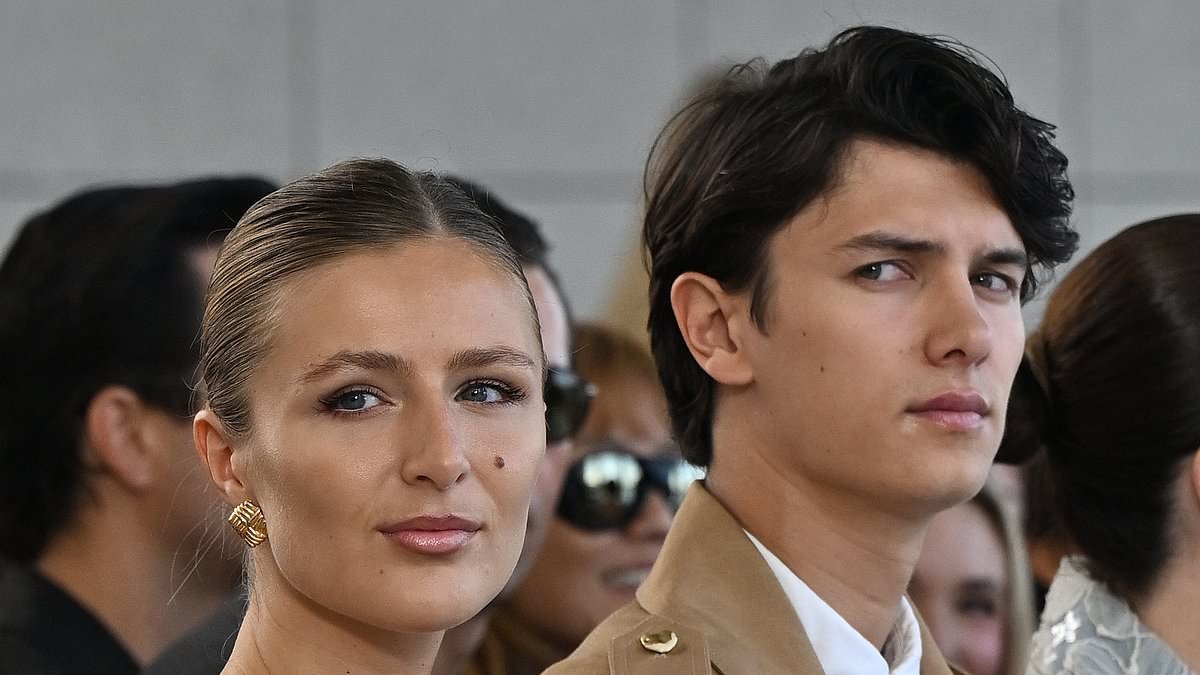 Holding court! Queen Mary's nephew Count Nikolai and his girlfriend Benedikte Thoustrup sit pretty in coveted front row at Australian Fashion Week after he was stripped of his royal title