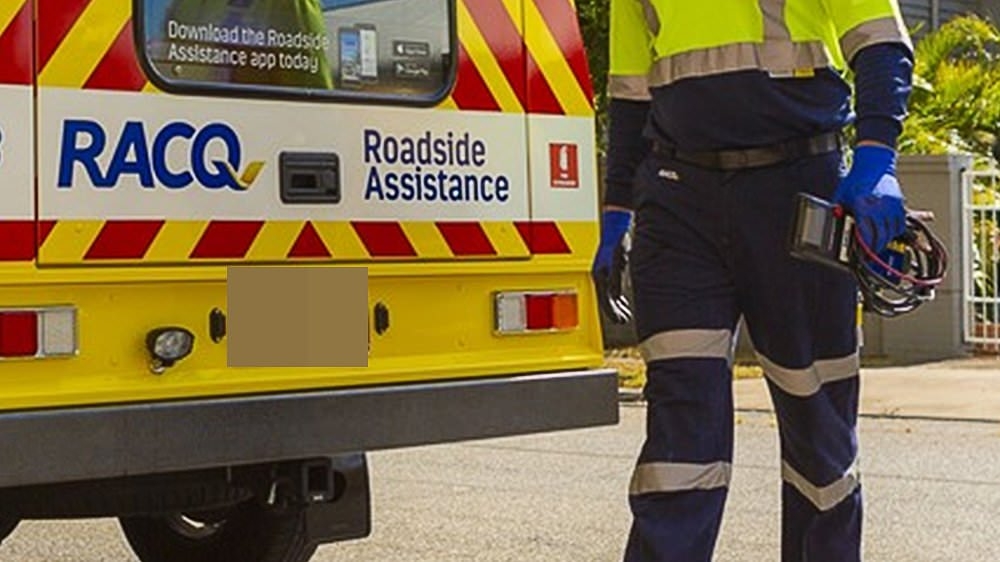 RACQ patrol driver called out to fix a flat tyre was repeatedly punched in the face. But he was the one sacked