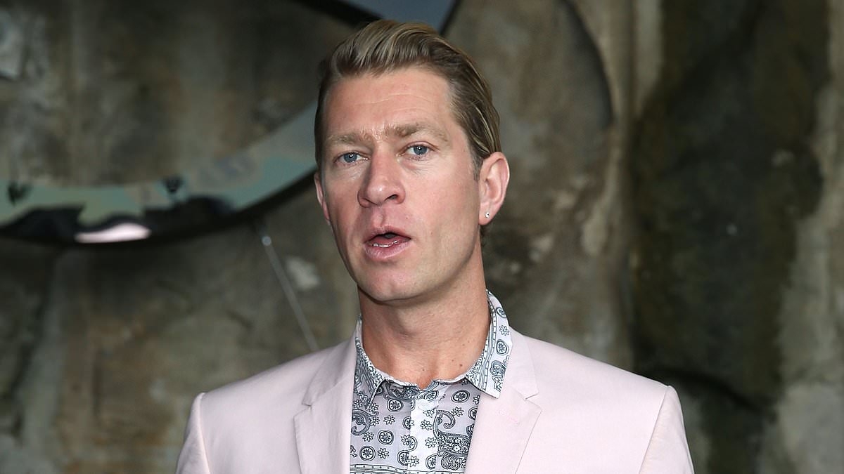 Ksubi designer Dan Single reveals he was 'dead for ten minutes' after fall from Paris hotel balcony as he makes shock return to limelight at Australian Fashion Week with racy art installation