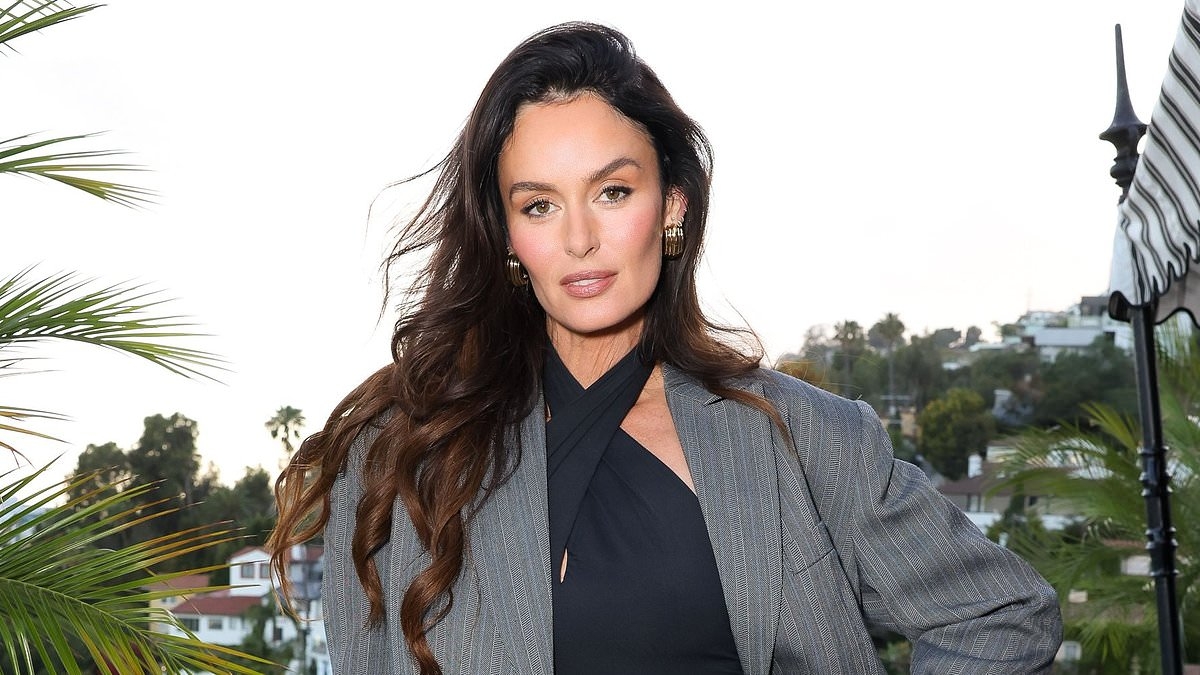 Nicole Trunfio shows off her long legs as she goes pantless at Anine Bing's 2025 summer collection launch in Los Angeles
