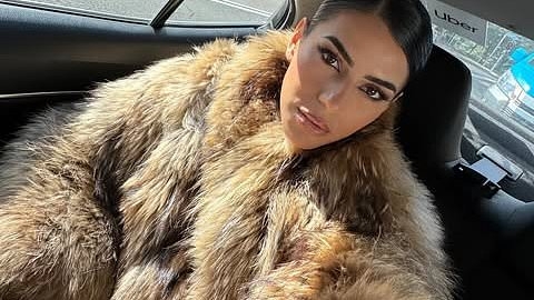 Married At First Sight star hits back after being slammed for wearing 'fur' to Fashion Week after animal skins are 'banned' at the annual event