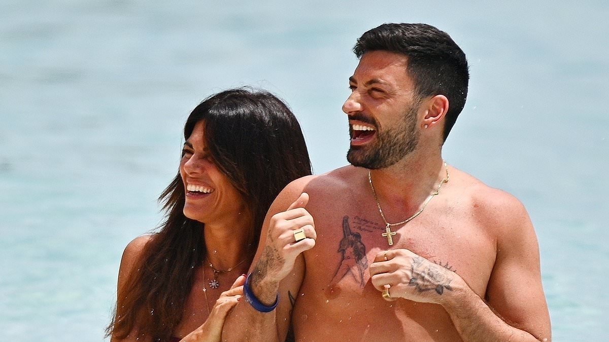 Ex Strictly star Giovanni Pernice puts on a loved-up display with bikini-clad girlfriend Bianca Guaccero as they enjoy a romantic Barbados getaway