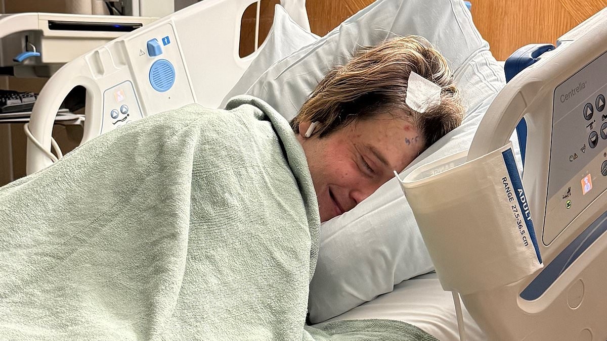 Celebrity psychic Tyler Henry reveals heartbreaking tumor after brain surgery as he shares hospital bedside photo