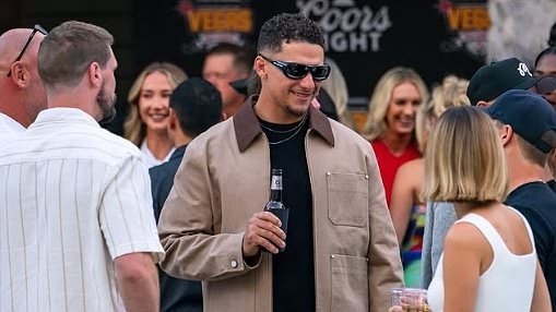 Patrick Mahomes sips a beer as he and Brittany welcome stars to his Las Vegas charity event