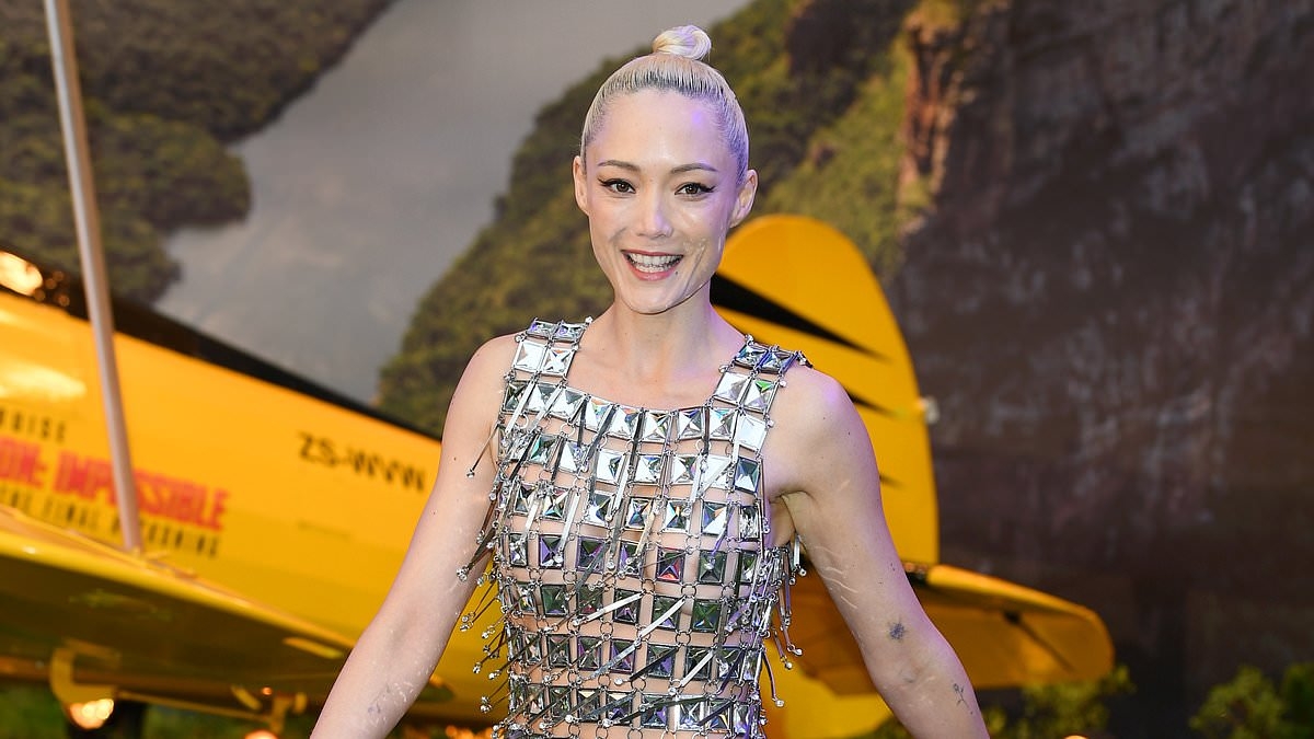 Pom Klementieff goes braless in a sexy silver chain dress at Mission: Impossible 8 premiere in London