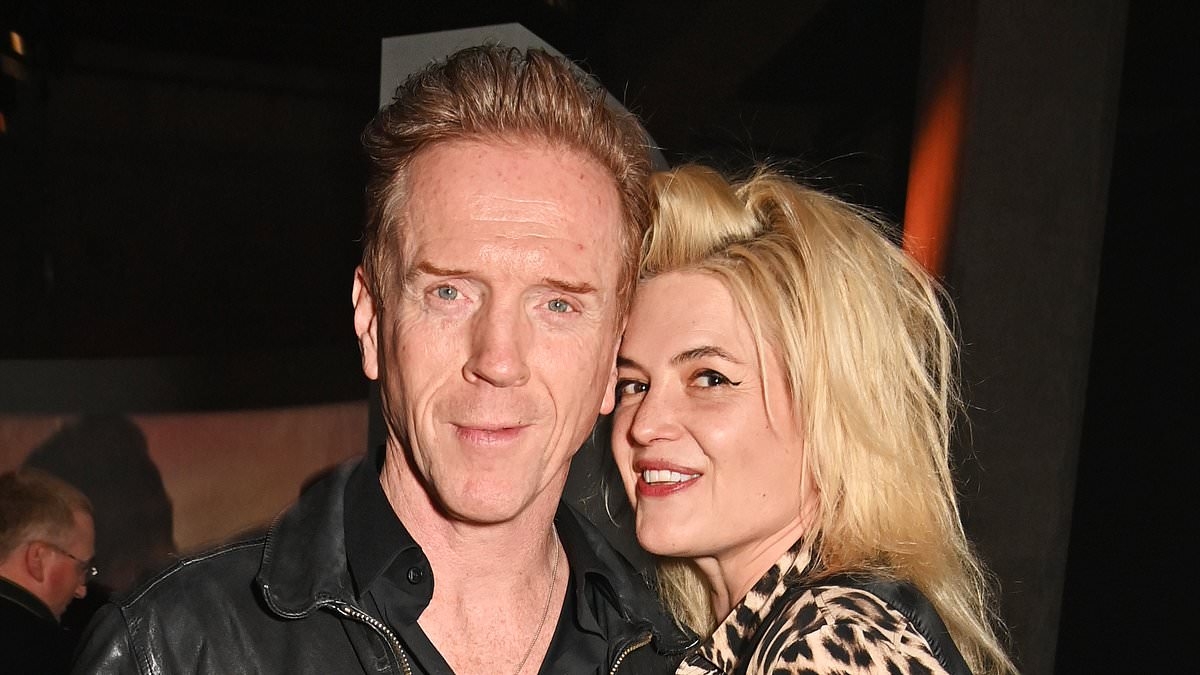 Damian Lewis puts on a cosy display with girlfriend Alison Moss as the besotted couple attend starry Moët Hennessy party in London