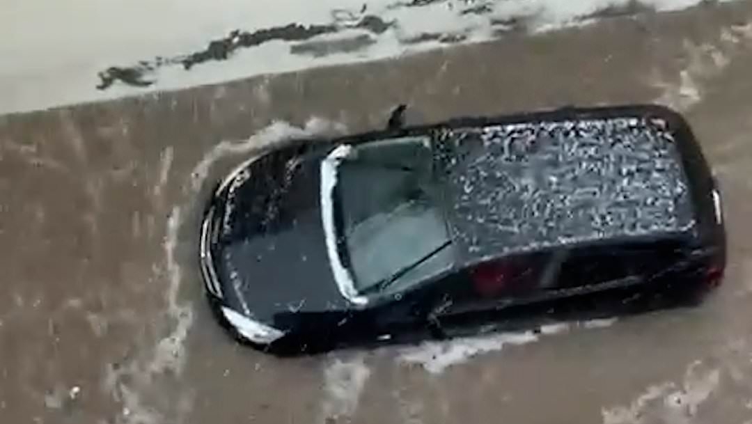 Costa Blanca roads turn into raging rivers as freak hail and rain storms lash Spanish holiday hotspot washing away cars