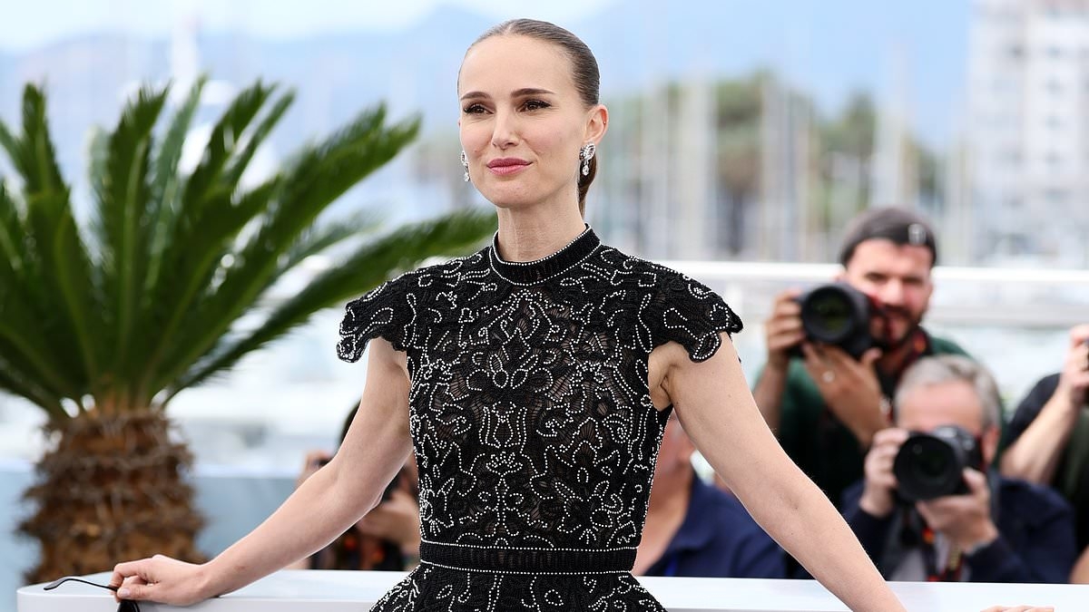 Natalie Portman puts on a VERY leggy display in a black embroidered mini dress as she poses at the Arco photocall during Cannes Film Festival