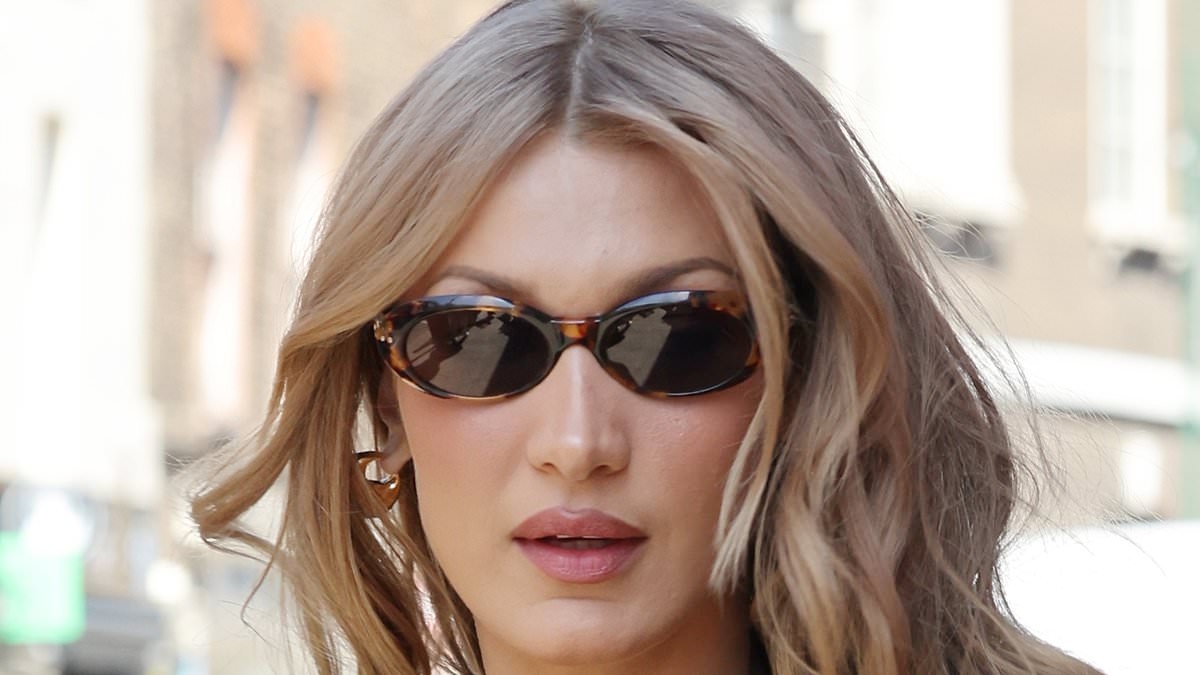 Supermodel Bella Hadid heads to famous budget fried chicken shop in London's Brick Lane after wowing on the Cannes red carpet