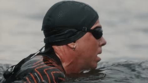 Legendary US rocker looks almost unrecognisable as he competes in a triathlon in Western Sydney