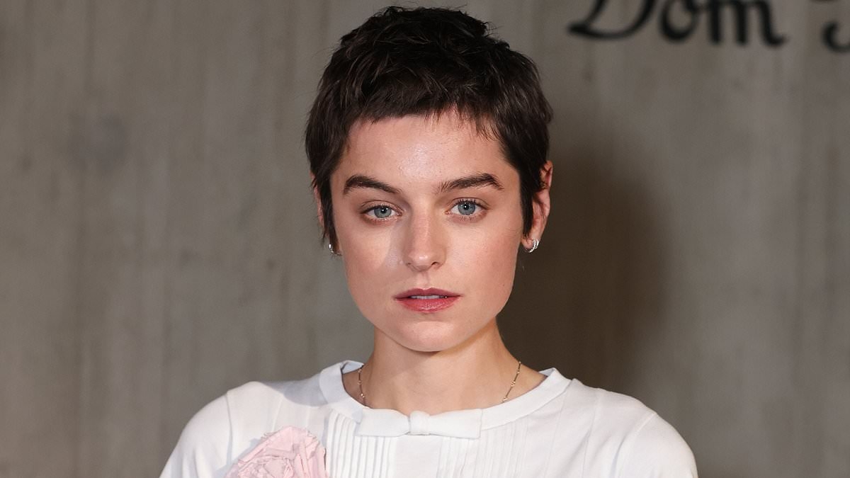 Emma Corrin showcases their quirky style in a fringed red skirt as they attend the Dom Pérignon party weeks after split from Rami Malek